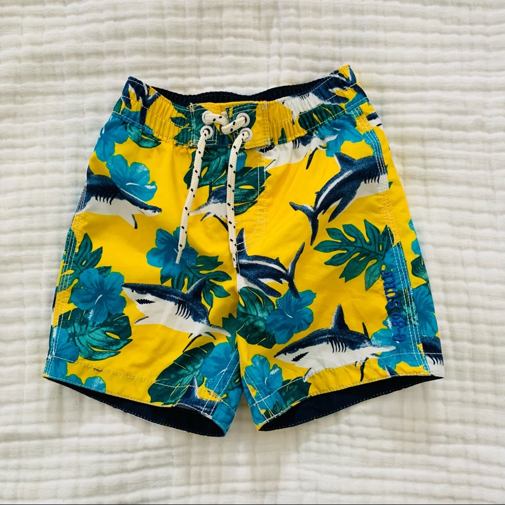 Bright yellow tropical shark swim trunks